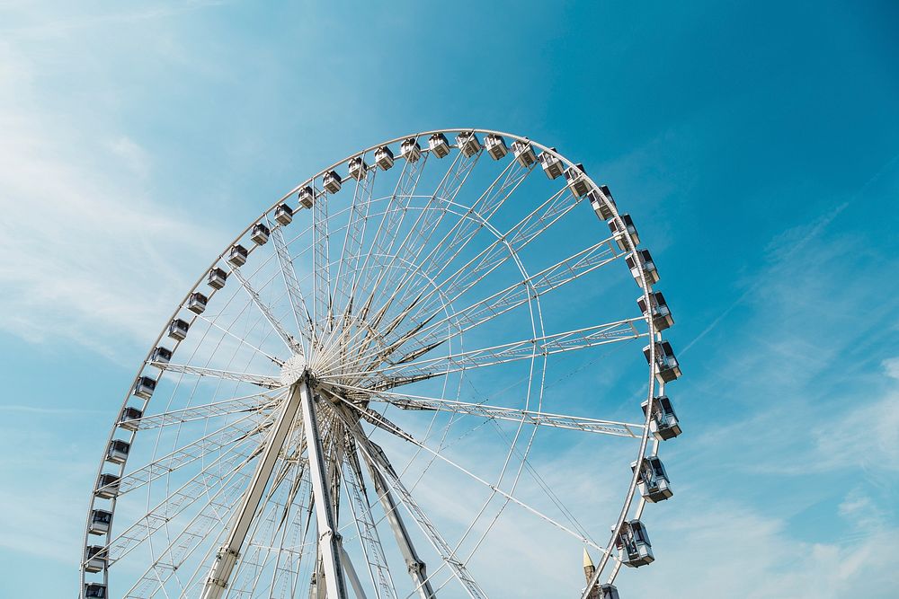 A large Ferris Wheel against a blue sky. Original public domain image from Wikimedia Commons