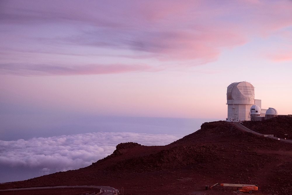 Observatory above the clouds atop Haleakala Crater, Maui during a pastel sunset. Original public domain image from Wikimedia…
