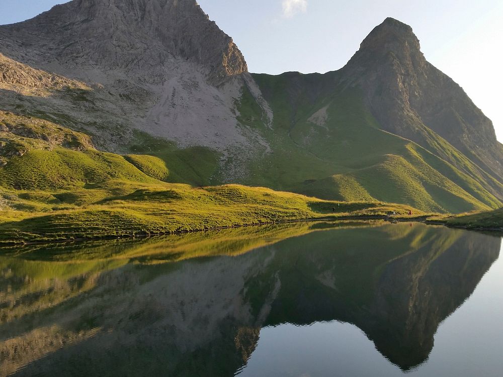 Reflection big mountains in the lake. Original public domain image from Wikimedia Commons