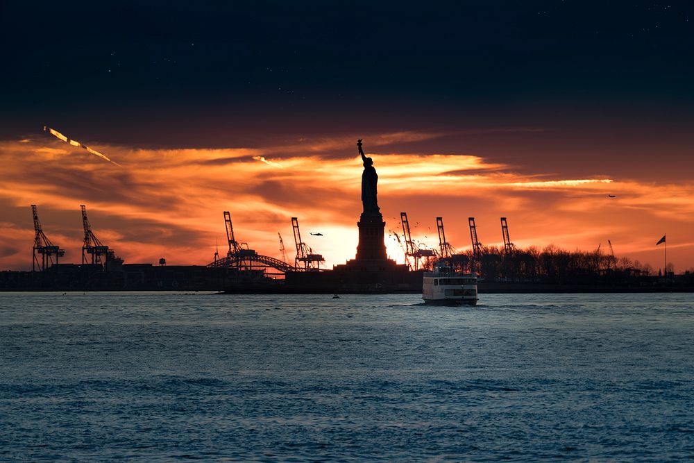 The Statue of Liberty and construction cranes and a ferry in front of a sunrise. Original public domain image from Wikimedia…