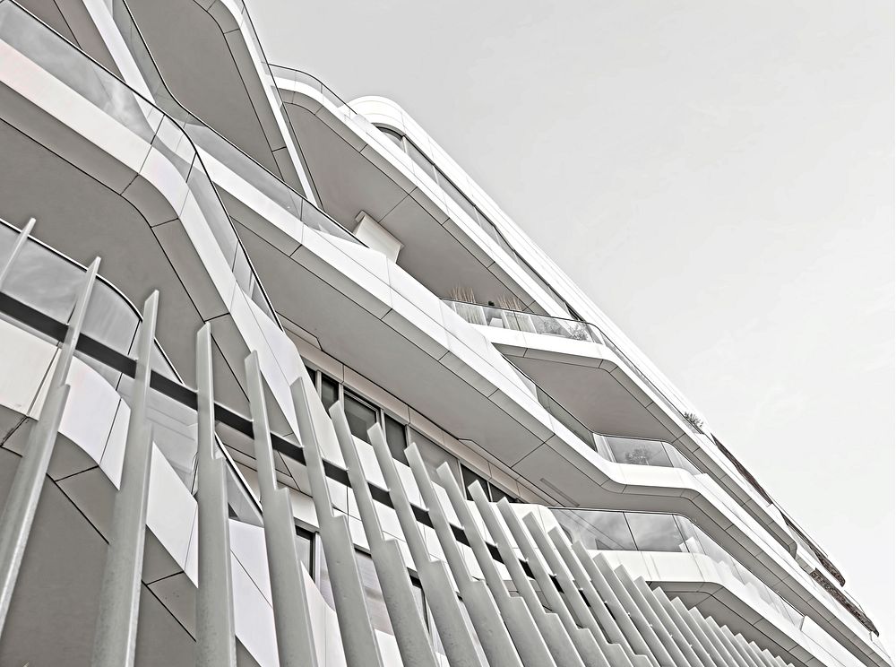 Patterns formed by unique white architecture on an office building. Original public domain image from Wikimedia Commons
