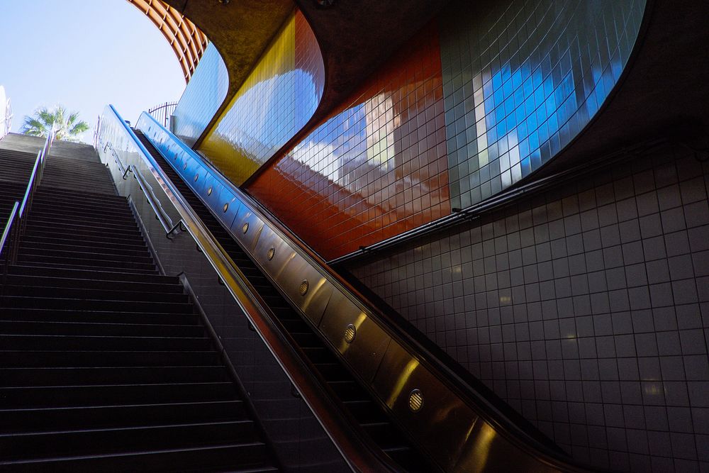Stairs and escalator leading up to the surface of the Metro station in Lankershim \u002F Chandler.. Original public domain…