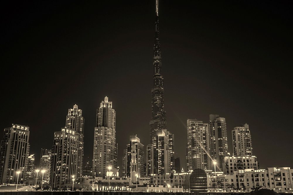 The night view of Dubai, Burj Khalifa can be seen in the middle. Original public domain image from Wikimedia Commons