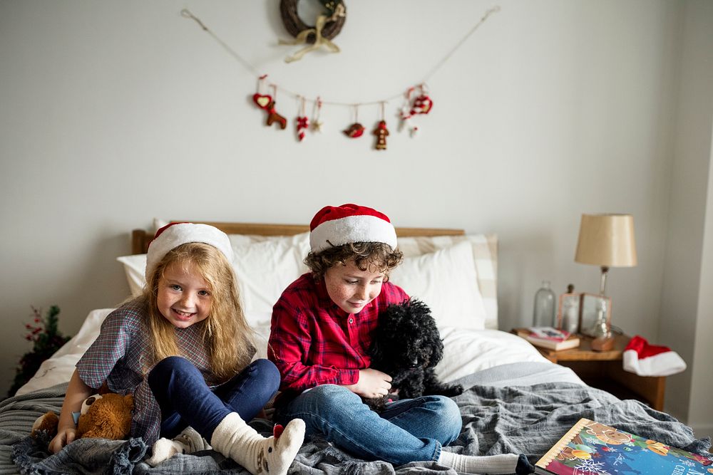 A Caucasian siblings enjoying Christmas holiday