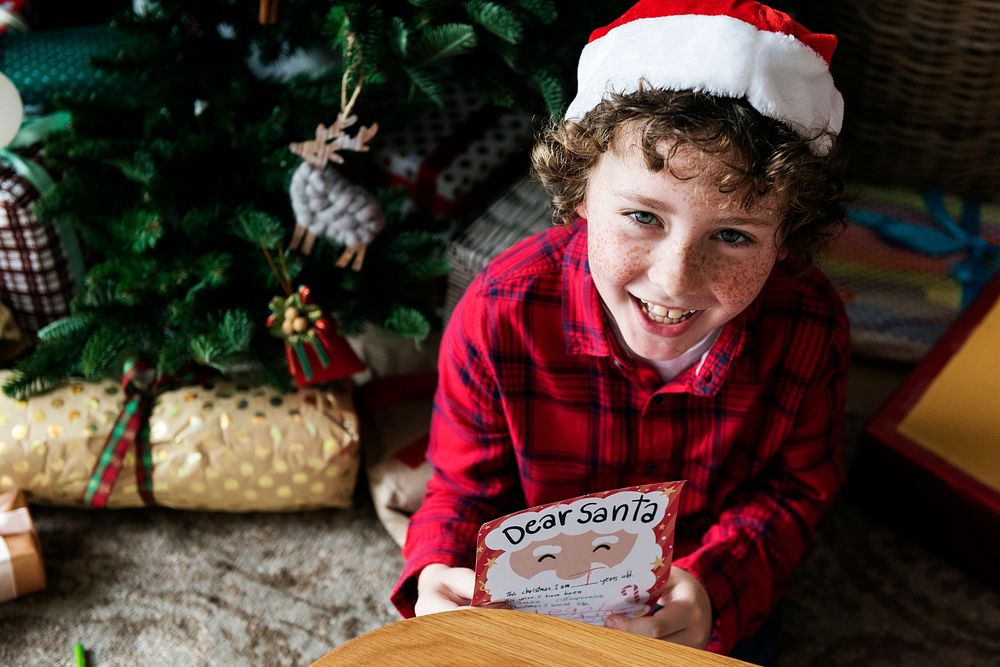 Kid with Christmas wish list