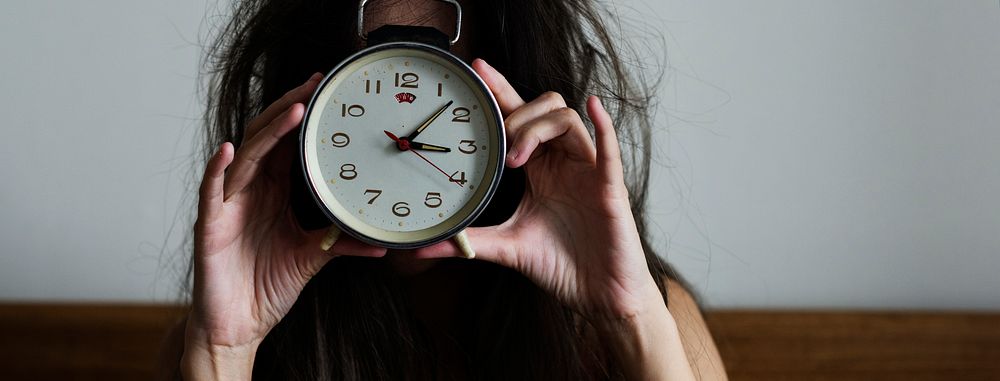 Messy hair girl wakes up with a clock social banner
