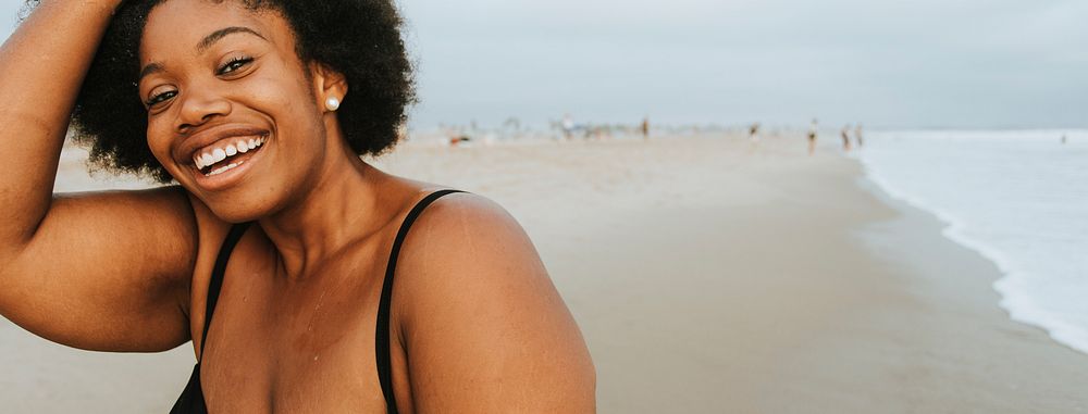 Beautiful plus size African American woman at the beach social banner