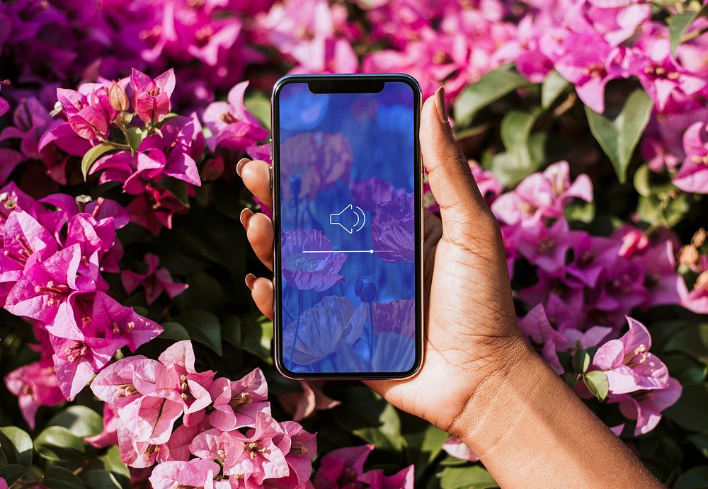 Mobile phone mockup, pink flowers wallpaper psd