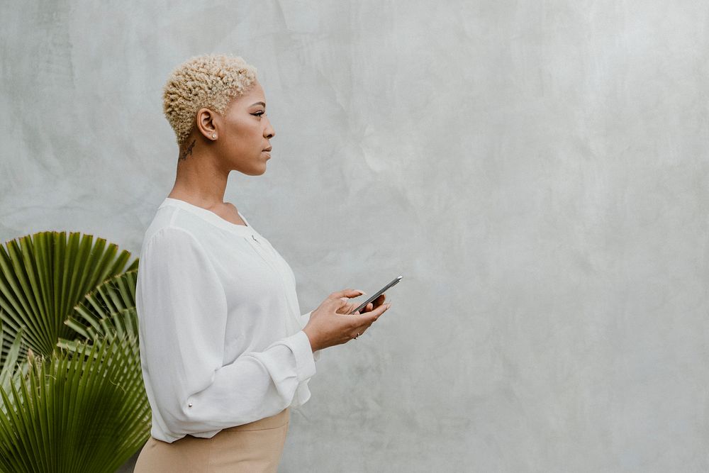 Black woman using her mobile phone