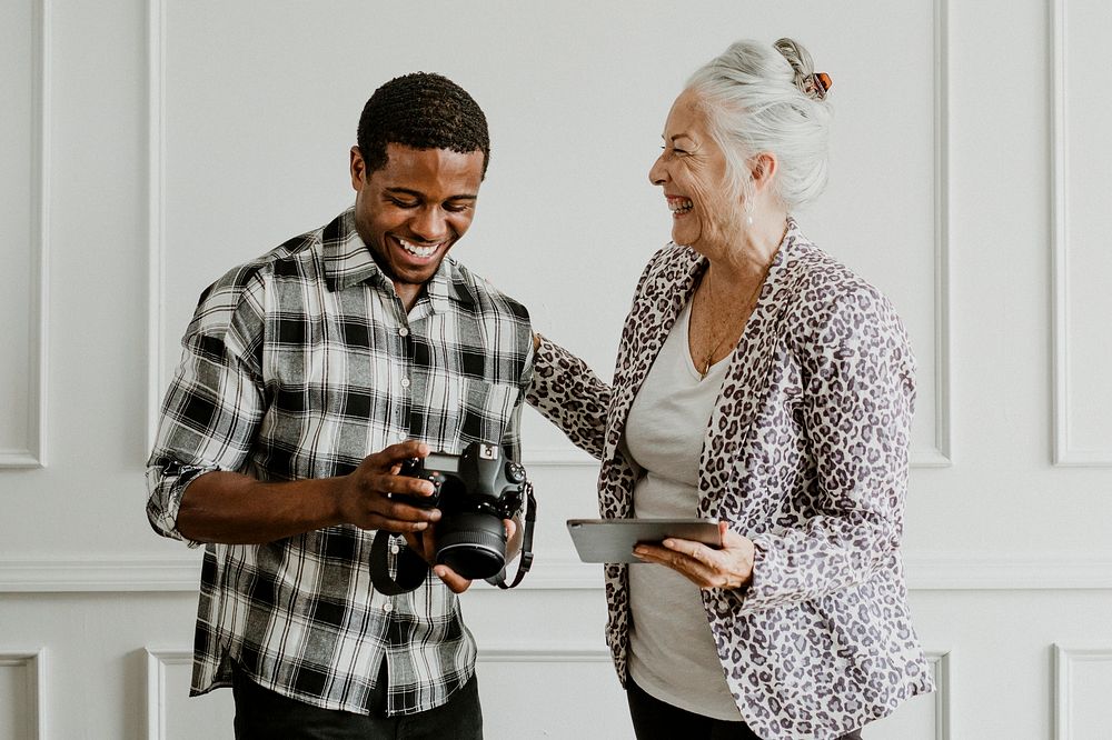 Male photographer and senior female client