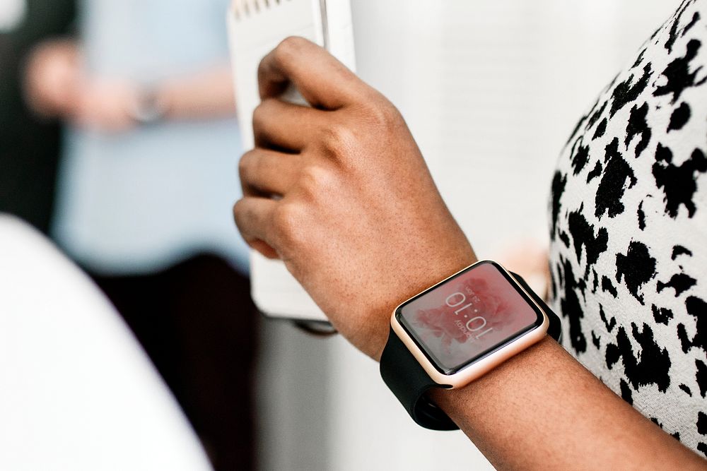 Young woman wearing a smartwatch mockup