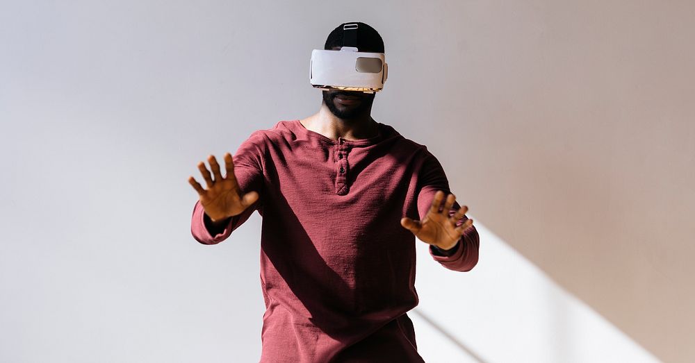 Black man experiencing virtual reality with VR headset social template