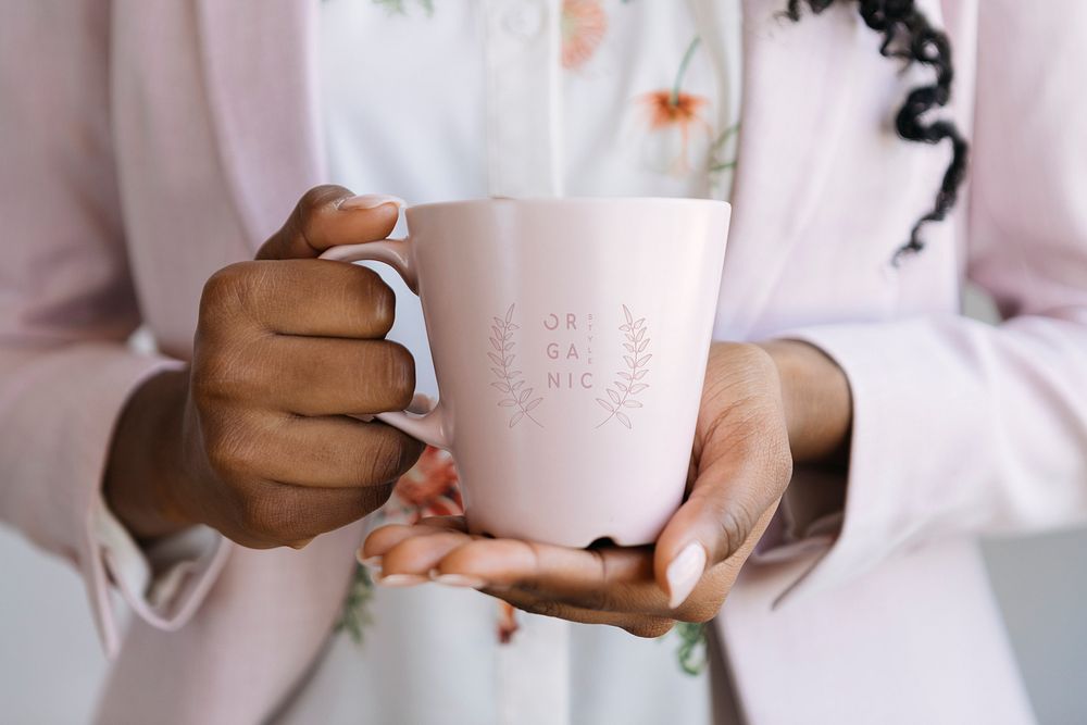 Woman holding a pink mug illustration
