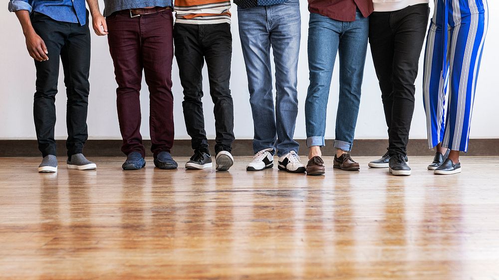 Group of people standing in a row