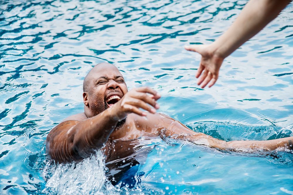 Man being rescued from the water