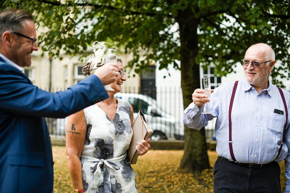 Relatives cheering with champagne in celebration
