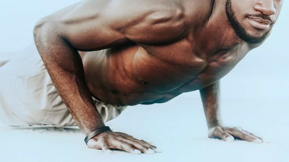 Strong man doing push-up exercises wallpaper 