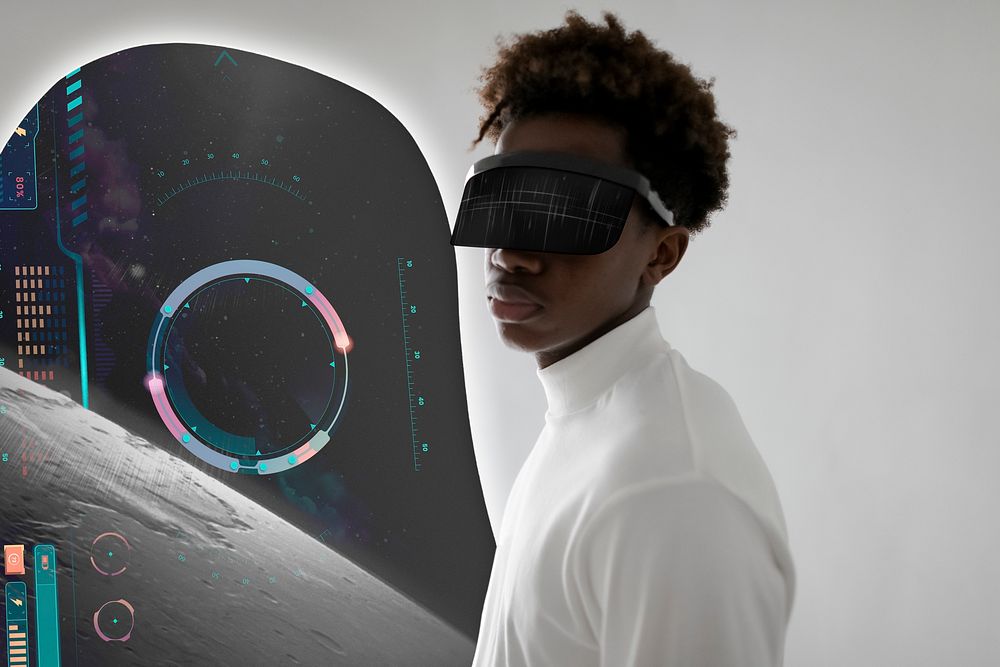 Man wearing smart glasses and showing hologram display futuristic technology