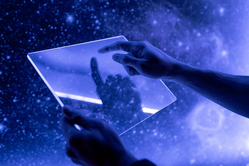 Scientist using a transparent digital tablet screen futuristic technology