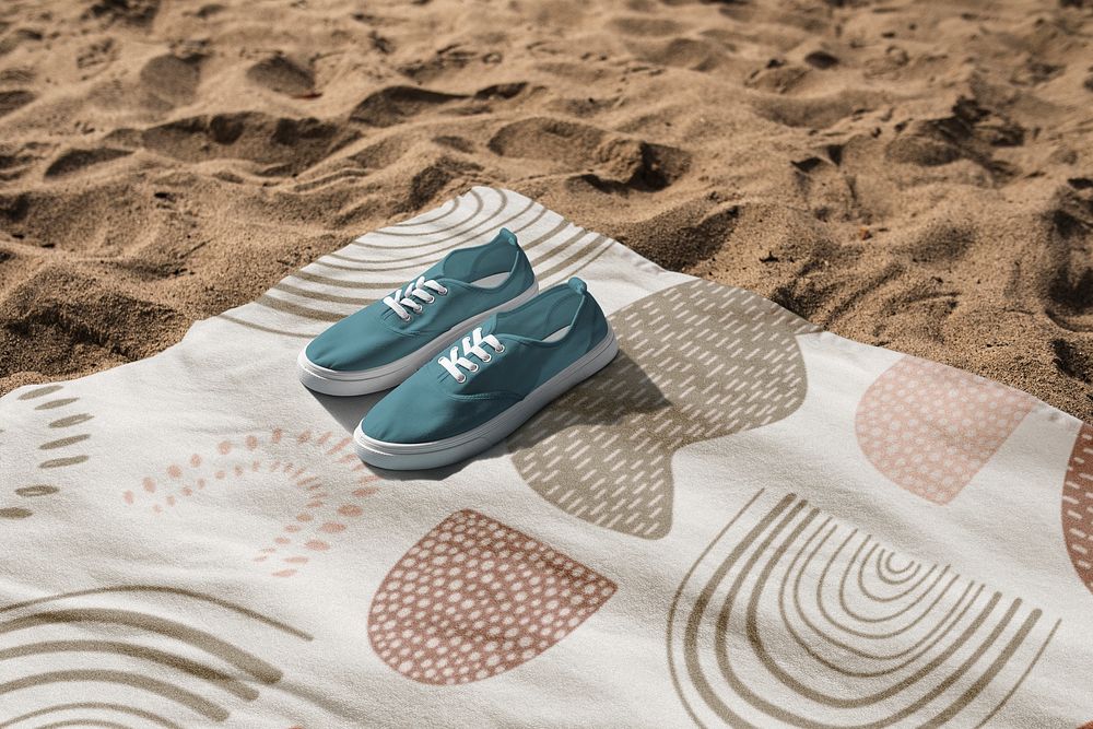 Blue sneakers on beach towel summer vibes photography