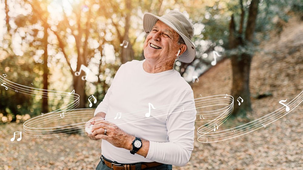 Retired man enjoying music in the middle of the forest 