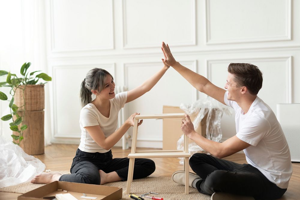 Couple assembling a diy chair from scratch