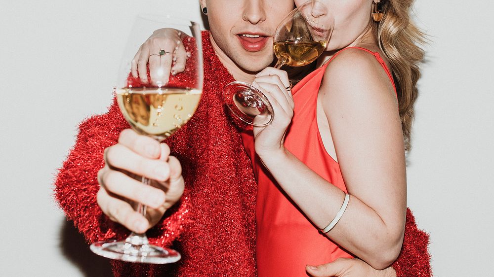 Young stylish couple with champagne