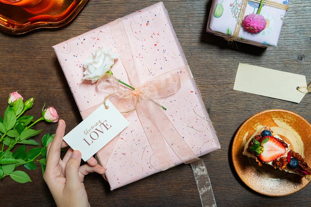 Pink gift box with a card