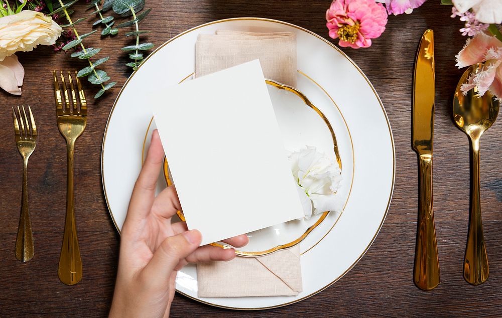 Invitation card on a plate in a reception