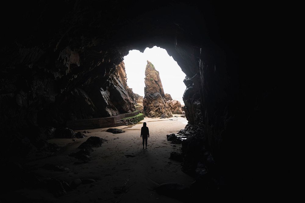 Woman at a cave entrance,  Channel Islands