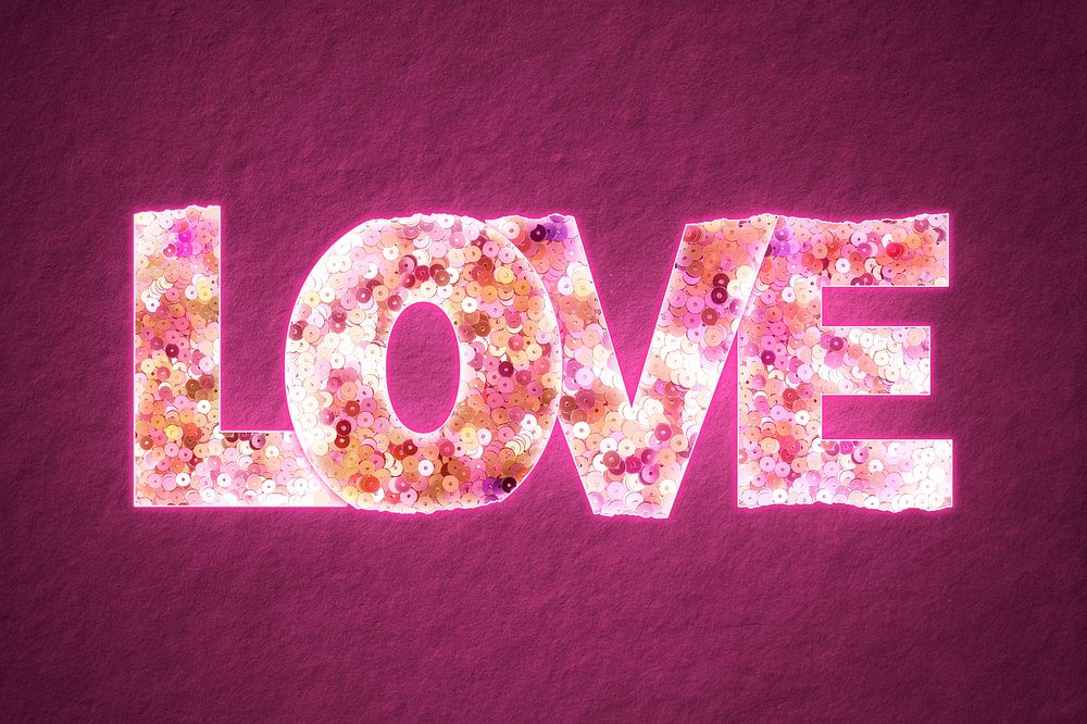 Glittery love word with sequin texture on pink background