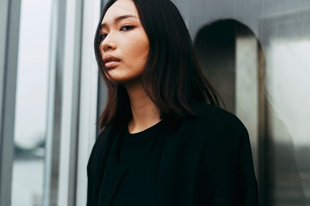 Beautiful woman in black t-shirt, fashion portrait