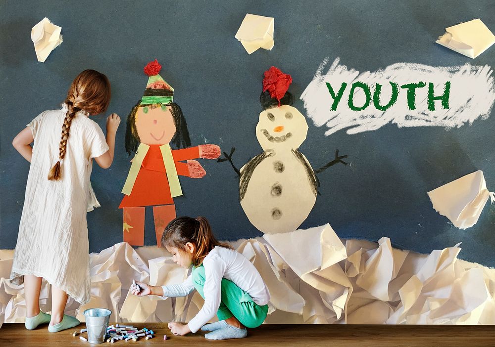 Children having fun with snowman artwork