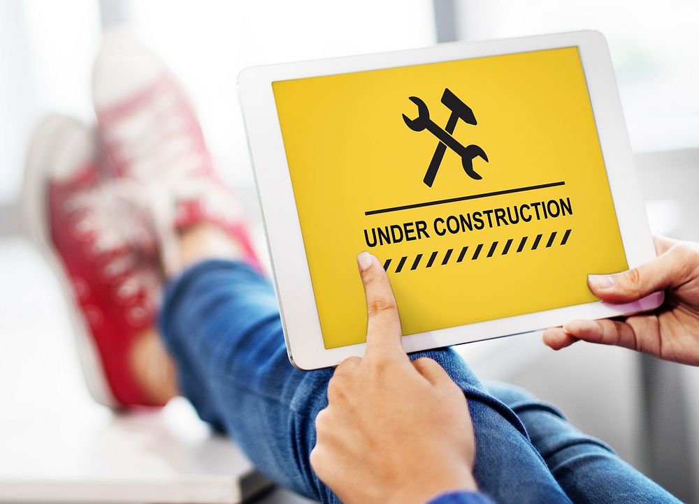 Under Construction Warning Sign Icon Concept