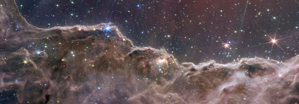 &ldquo;Cosmic Cliffs&rdquo; in the Carina Nebula (NIRCam and MIRI Composite Image)