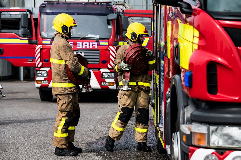 Firefighter preparing, April 15, 2019, Cheshire, UK. Original public domain image from Flickr