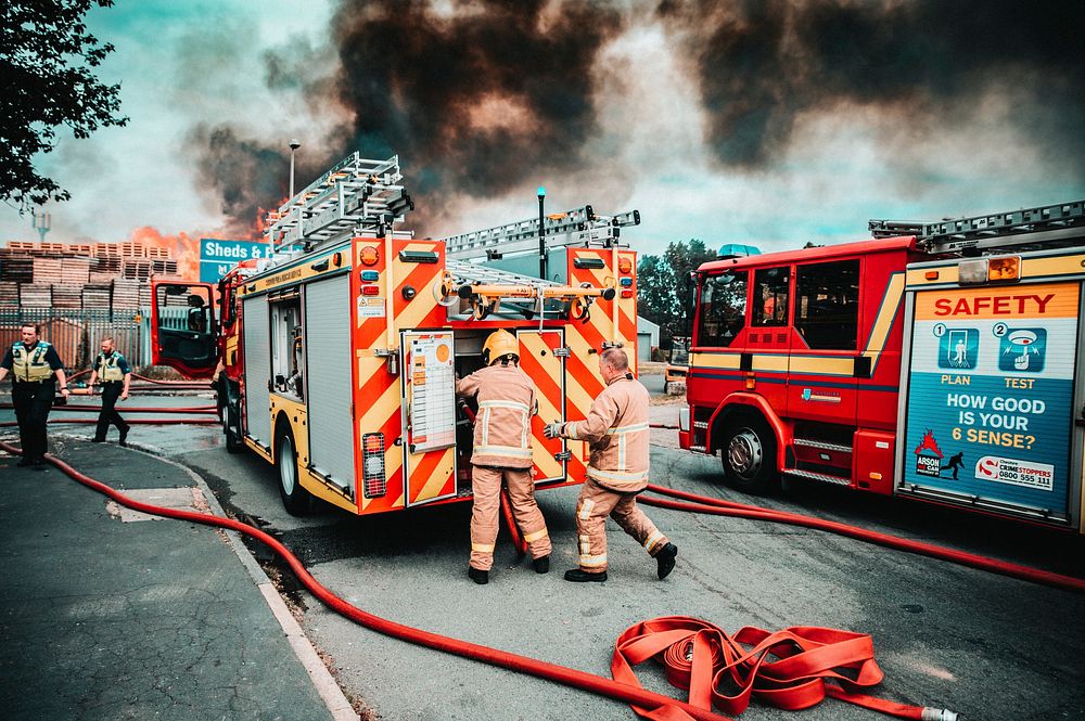 Fire truck & firefighters, May 24, 2019, Winsford, UK. Original public domain image from Flickr