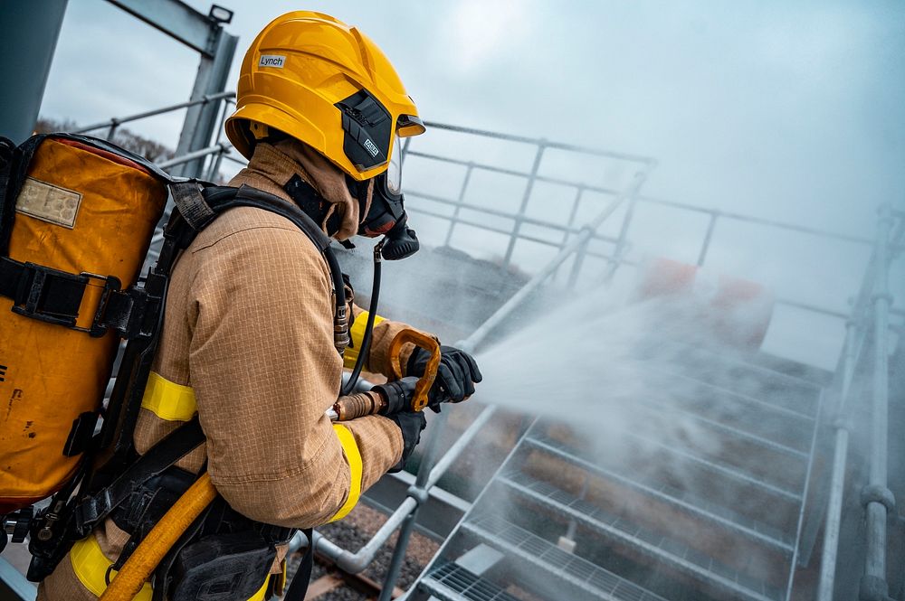 Firefighter petrochemical rig training, March 18, 2021, Cheshire, UK. Original public domain image from Flickr