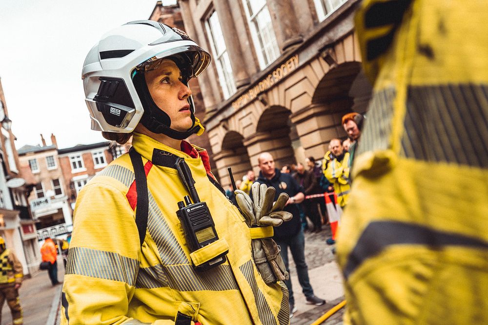 Female firefighter, May 9, 2022, Cheshire, UK. Original public domain image from Flickr