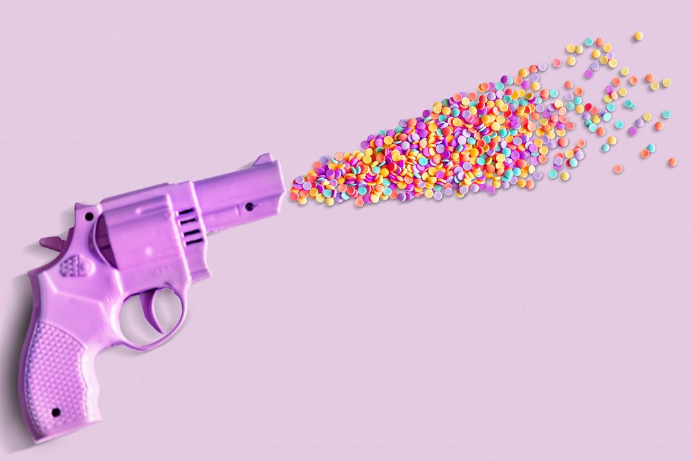 Colorful plastic toy gun photo