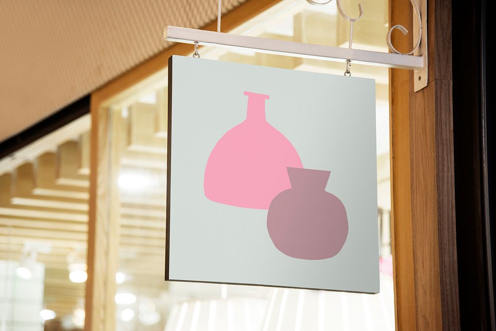 Hanging shop sign, colorful shapes