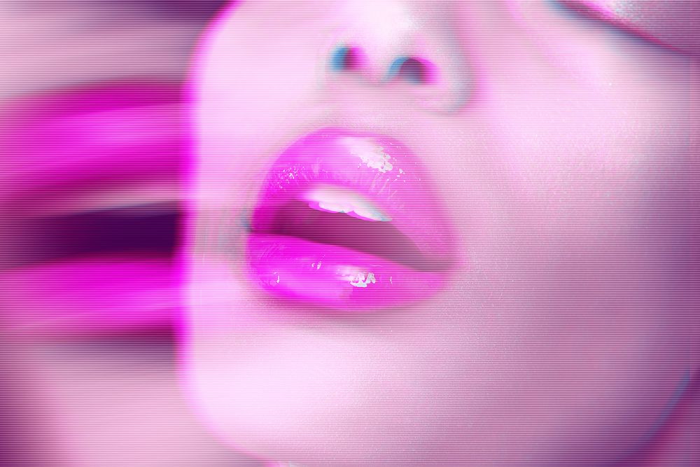 Woman face with sensual pink lips