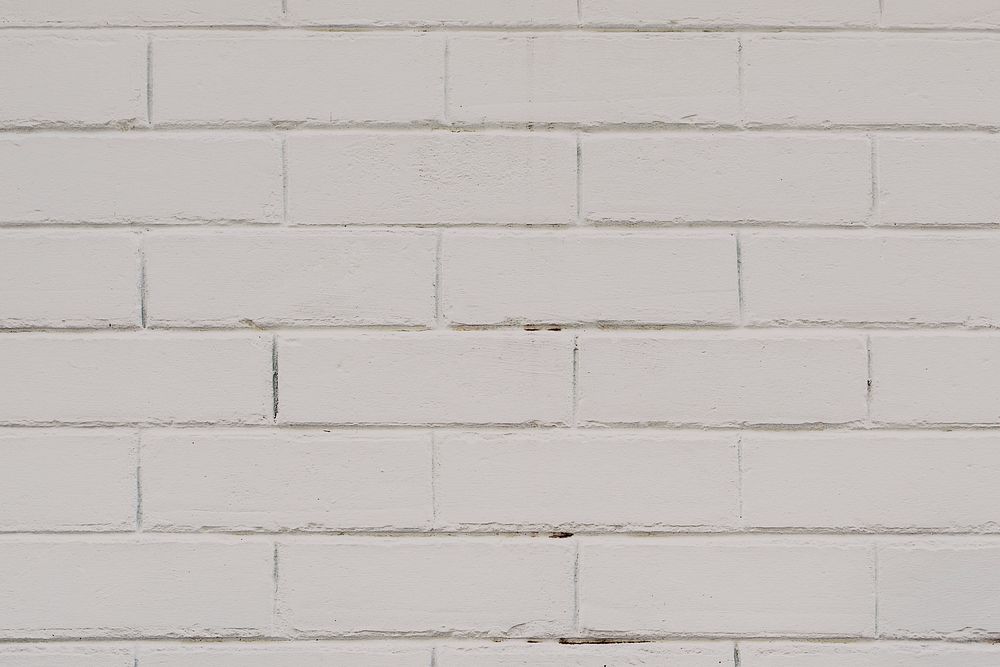 Gray textured brick wall background