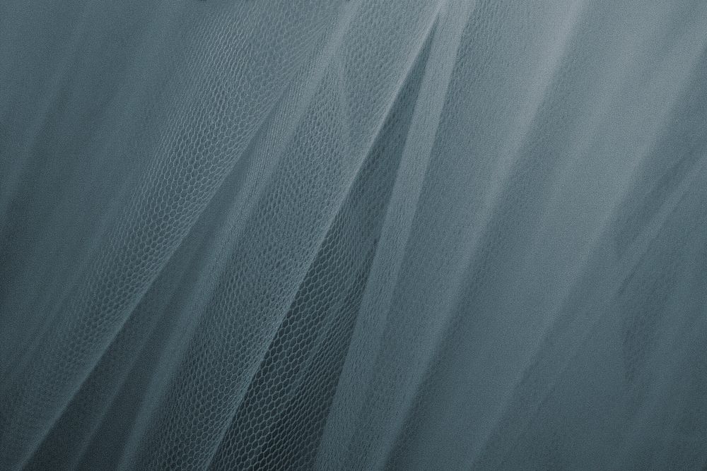 Bluish gray tulle drapery textured background