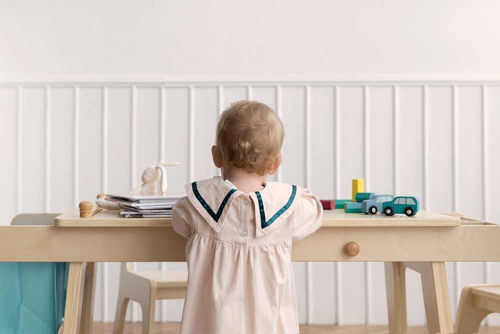 Toddler playing in play room
