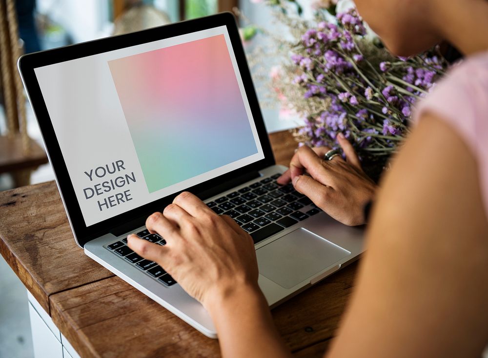 Woman using a laptop mockup screen