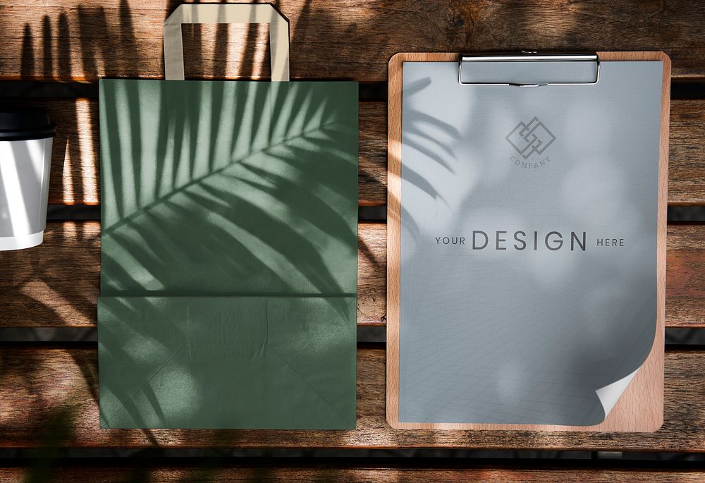 Paper on a clipping board and paper bag mockup