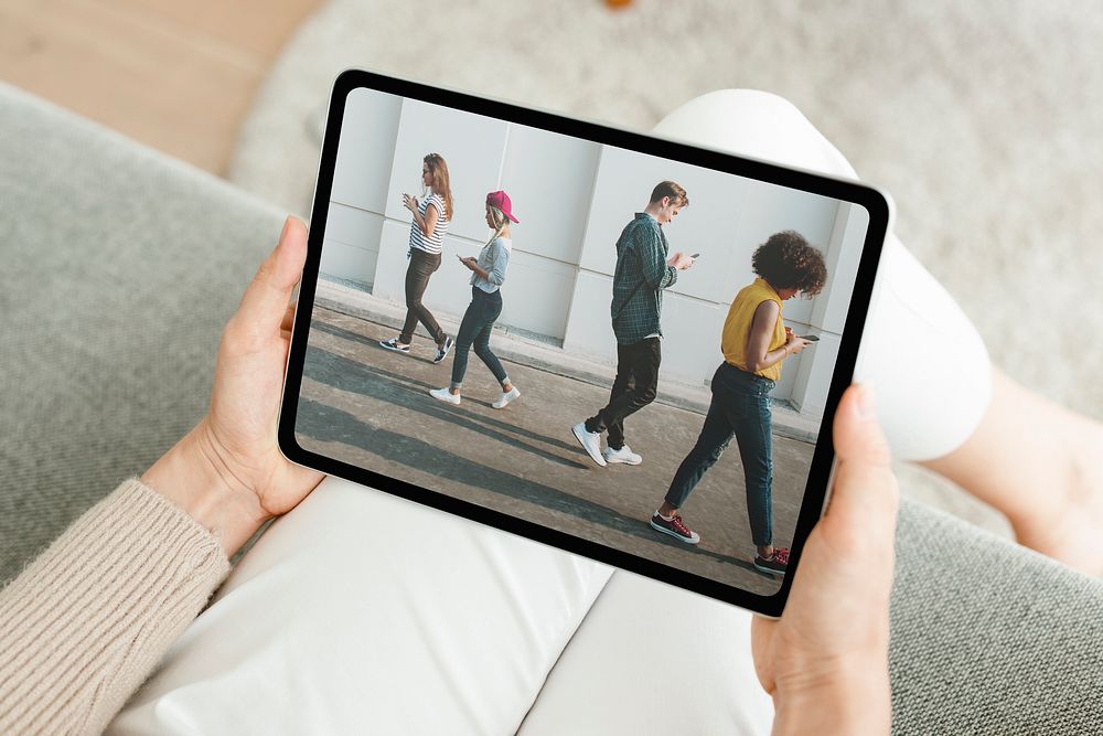 Social media addicts photo on tablet screen