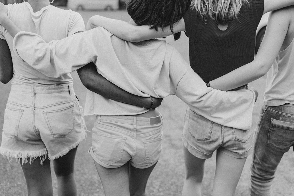 Girls hugging, best friends, gray photo