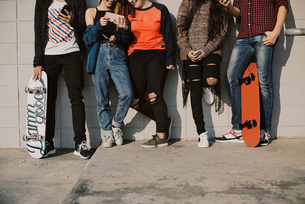Teenage skateboarders hanging out, hobby, street urban photo
